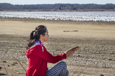 Side view of woman on beach