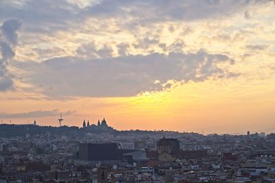 High angle view of buildings at sunset