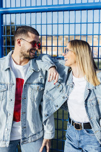 Girlfriend and boyfriend laughing and looking each other. happy couple.