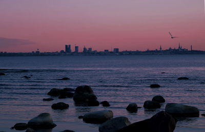 Scenic view of sea against sky during sunset