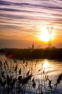 Scenic view of lake during sunset