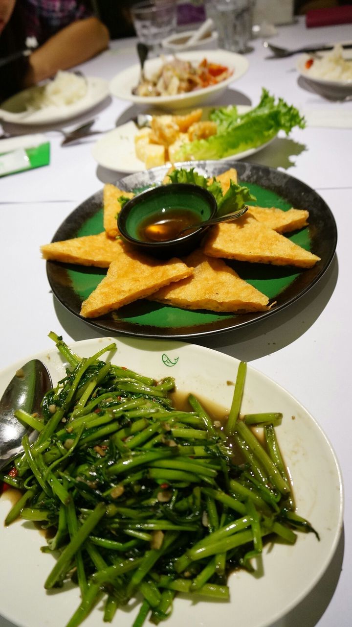 food and drink, indoors, food, plate, freshness, ready-to-eat, still life, table, close-up, healthy eating, serving size, indulgence, meal, vegetable, leaf, served, high angle view, seafood, focus on foreground, no people