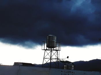 Low angle view of water tower against sky