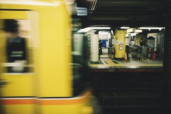 TRAIN AT RAILROAD STATION PLATFORM