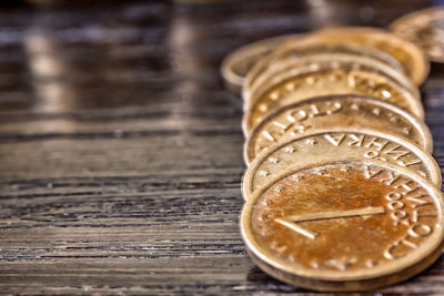 Close-up of coin on table