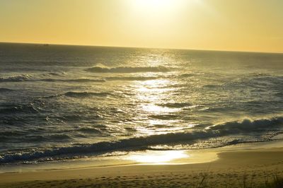 Scenic view of sea at sunset