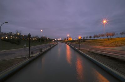 Illuminated street lights at night