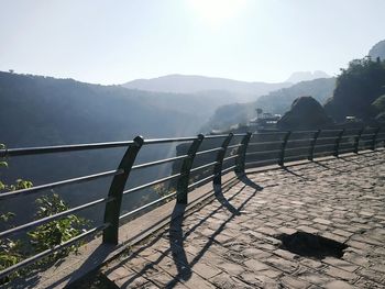 Scenic view of landscape and mountains against sky