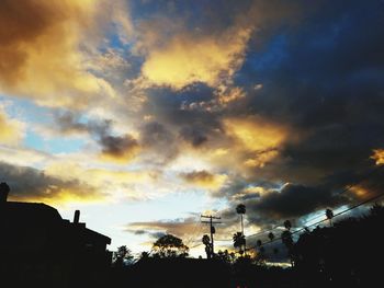 Low angle view of dramatic sky during sunset