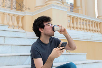 Young man using mobile phone