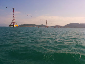 View of vinpearl cable car over sea against sky