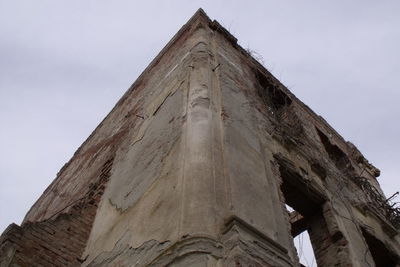 Low angle view of bell tower against sky