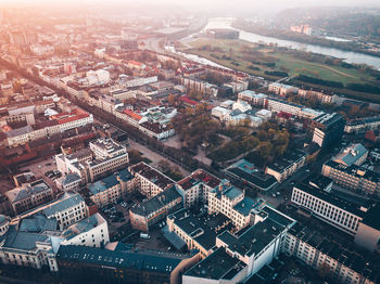 High angle view of river amidst buildings in city