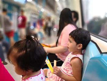 Girls sitting in train