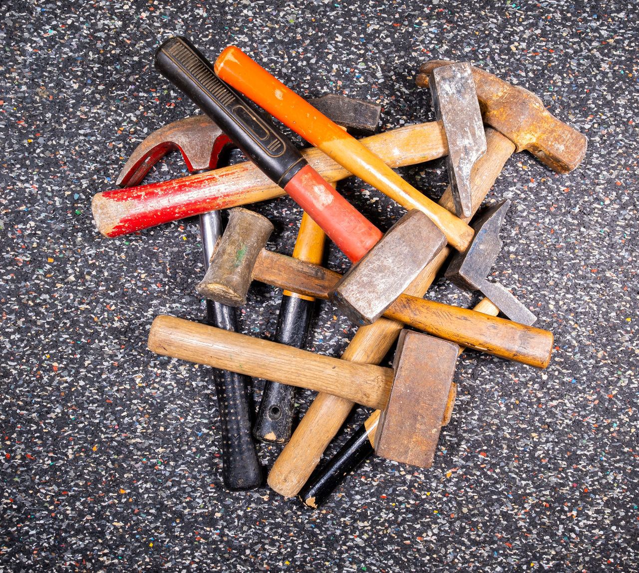 HIGH ANGLE VIEW OF BROKEN CAN ON WOODEN FLOOR