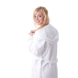 Portrait of a smiling young woman over white background