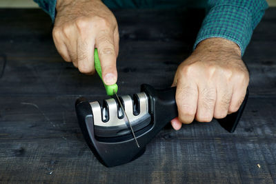 Close-up of man working on table