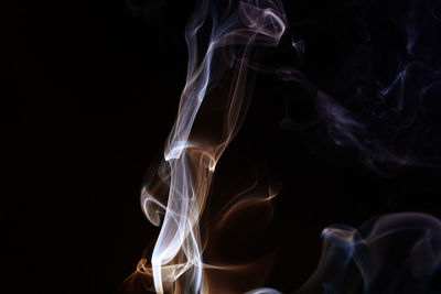 Close-up of smoke against black background