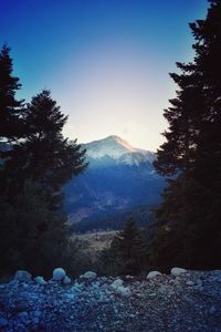 Scenic view of mountains against clear sky during winter