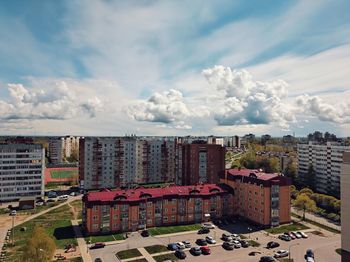 High angle view of buildings in city against sky