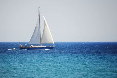 Boat sailing in sea