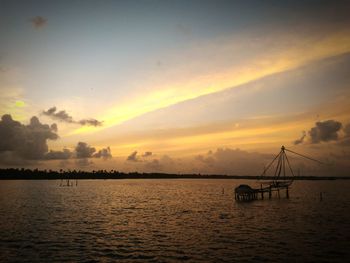 Scenic view of sea at sunset