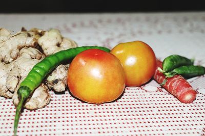 Close-up of tomatoes in plate on table