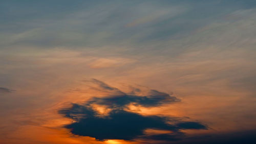 Low angle view of dramatic sky during sunset