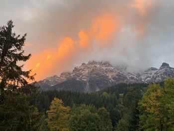 Scenic view of mountains against sky during sunset