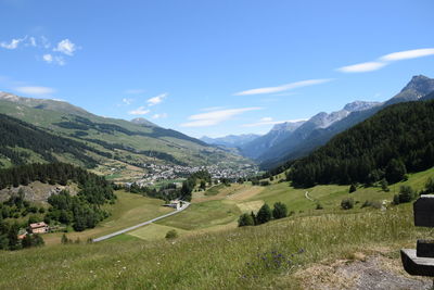 Scenic view of landscape and mountains against sky