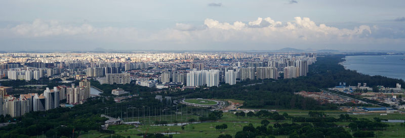 High angle view of buildings in city against sky