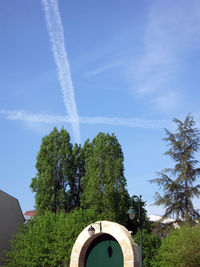 Low angle view of vapor trail against sky