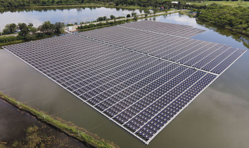 The solar panels or solar cells on buoy floating. power plant with water, renewable energy source.