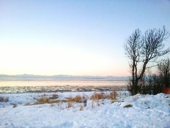 Scenic view of snow against clear sky