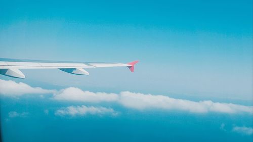 Low angle view of airplane flying in sky