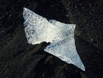 High angle view of ice in water at night