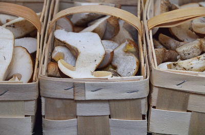 Mushrooms in baskets at market for sale