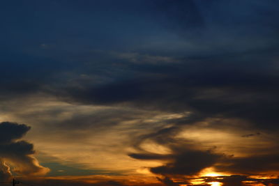 Low angle view of dramatic sky during sunset