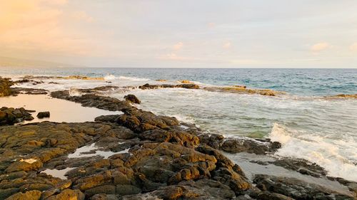 Scenic view of sea against sky during sunset