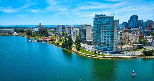 High angle view of buildings in city against sky