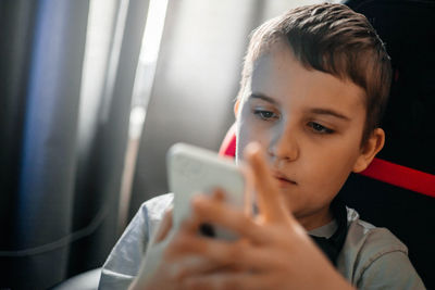 Young woman using mobile phone