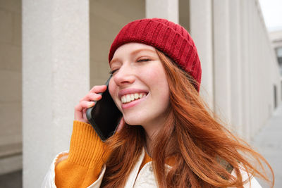 Portrait of young woman looking away