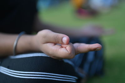 Close-up of hand holding hands