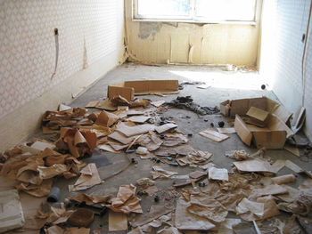 High angle view of abandoned paper on floor