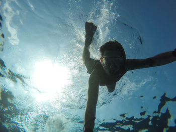 Man swimming in sea