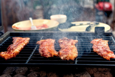 Close-up of meat on barbecue grill
