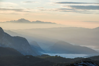 Scenic view of mountains against sky during sunset