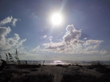 Sun shining over sea