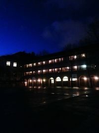 View of illuminated buildings at night