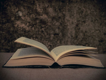 Close-up of open book on table